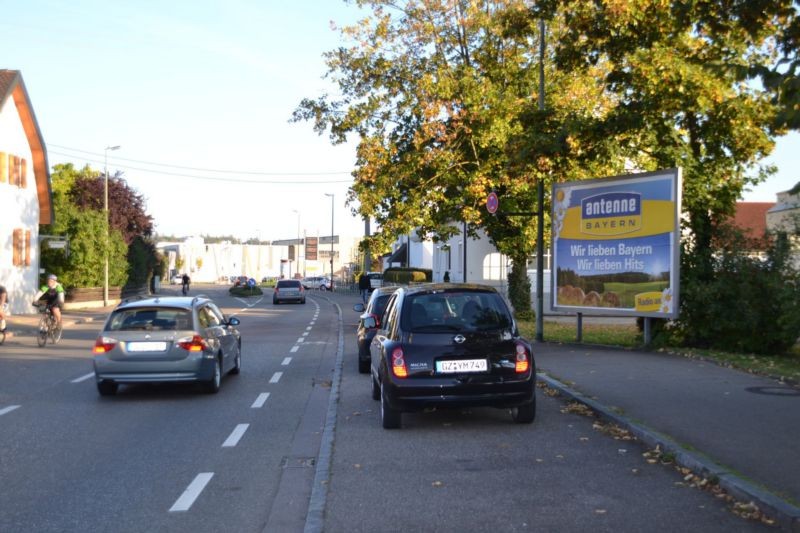 Augsburger Str/geg. evang. Kirche (Zufahrt V-Markt)